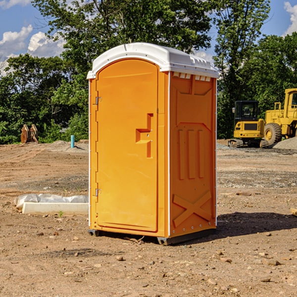 what is the cost difference between standard and deluxe portable restroom rentals in Algona